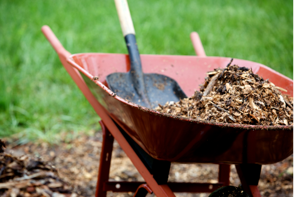 Fresh mulch prepared for installation in landscape beds to improve plant health and weed control in Brookfield, CT